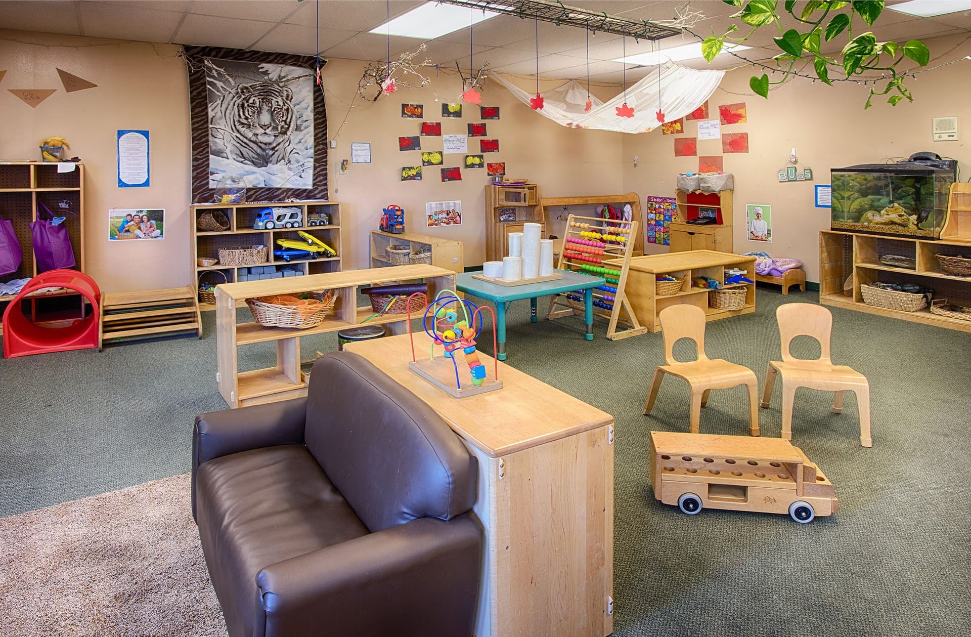 A teacher with Pre-K children at Blue Skies Exploration Academy